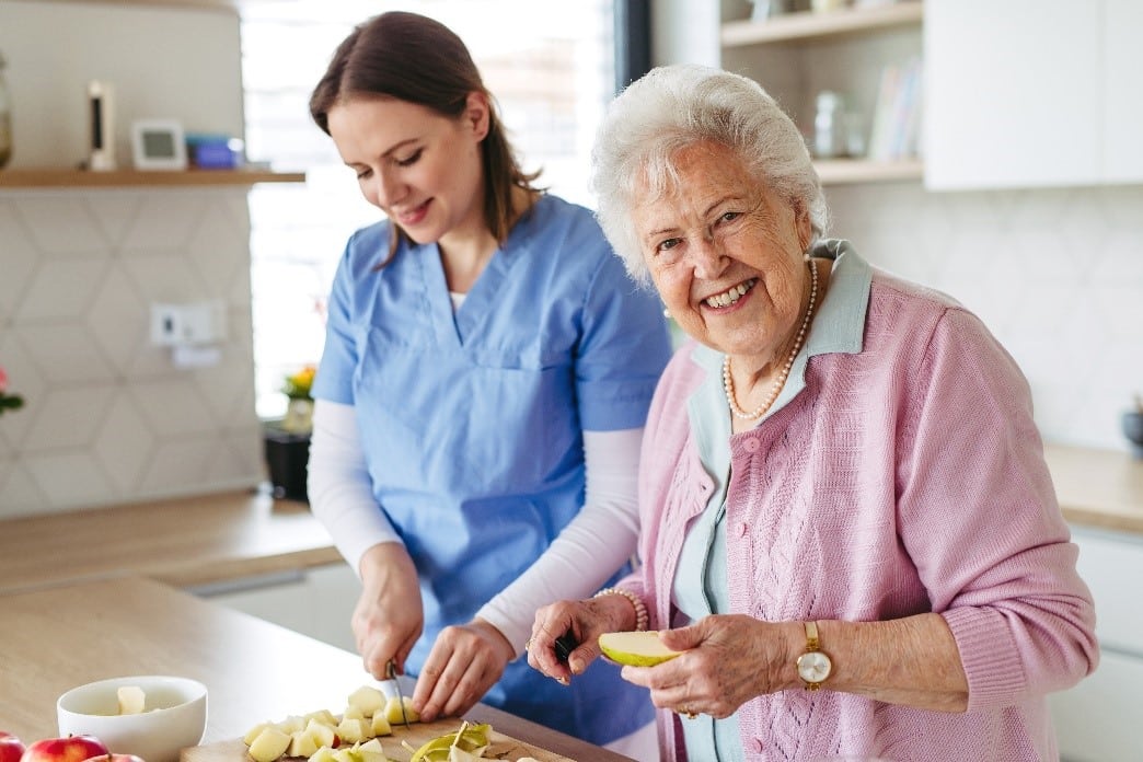 Happy Senior with care giver